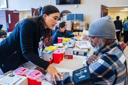 a student interacts with a patient
